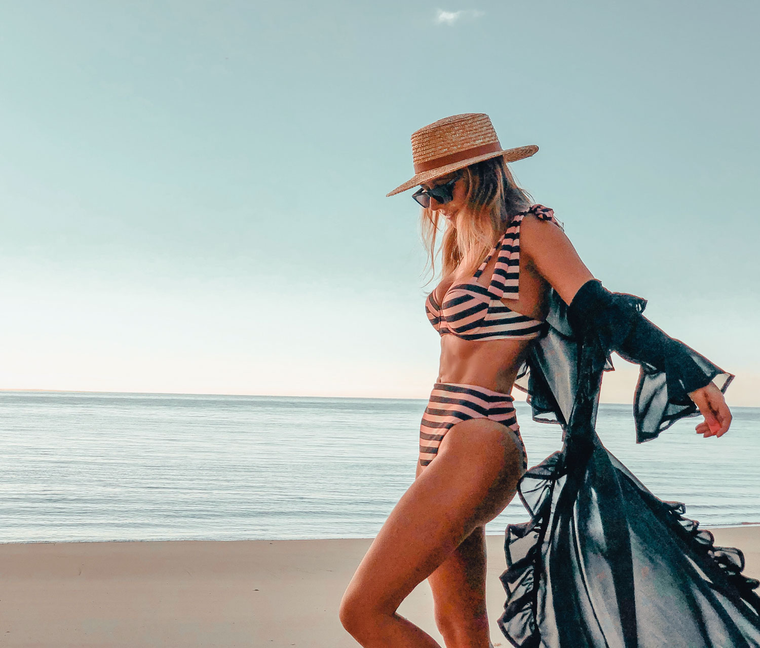 a person sitting at a beach