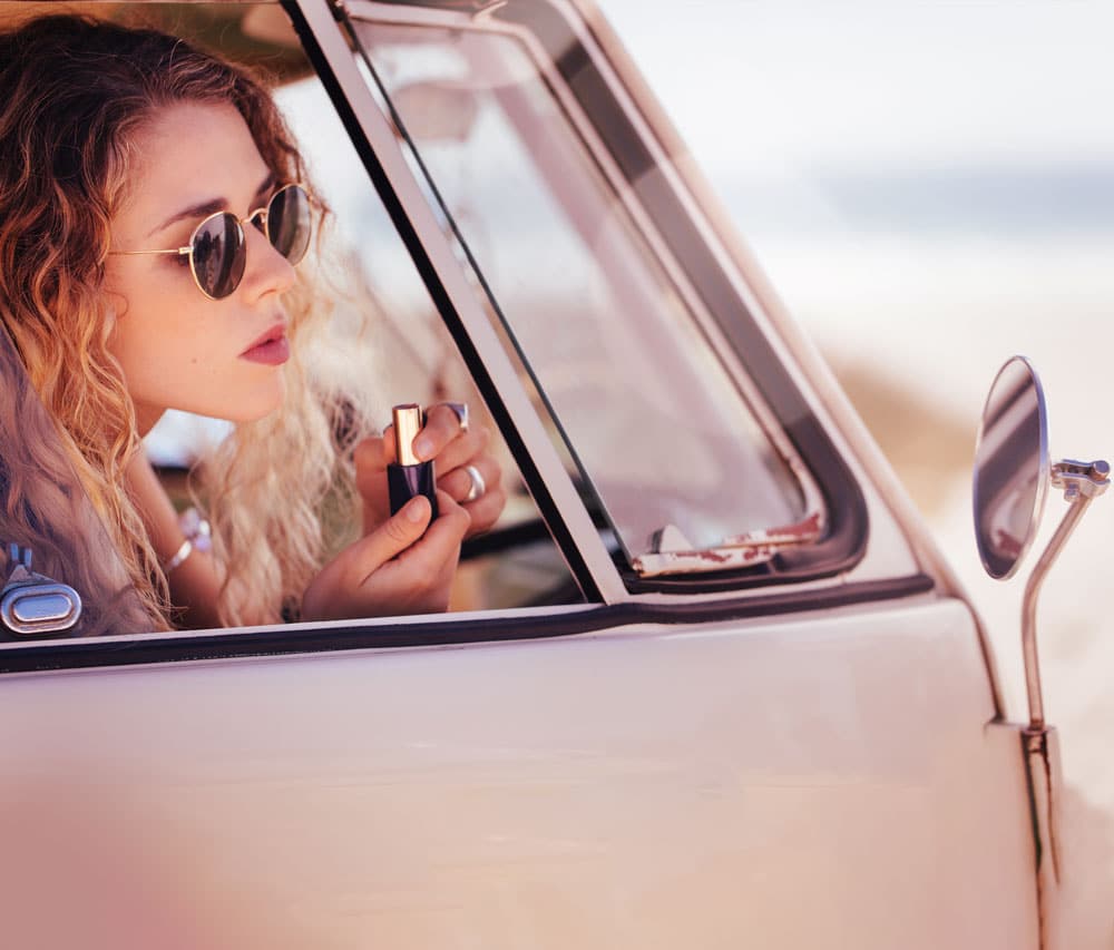 a woman sitting in a car